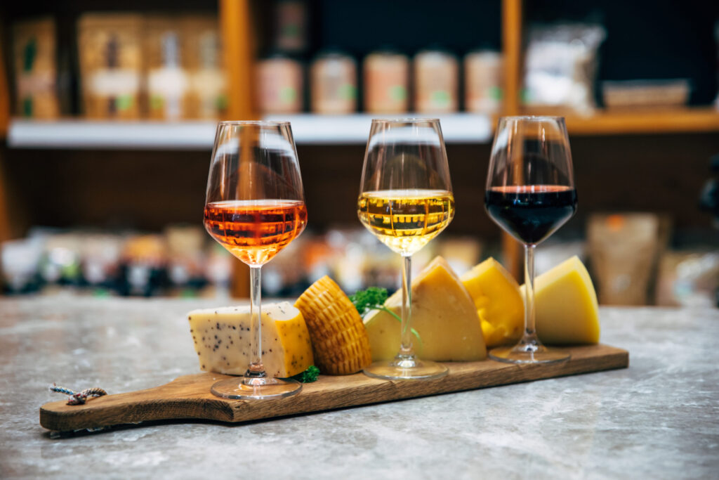 Glasses of wine with cheese pairing