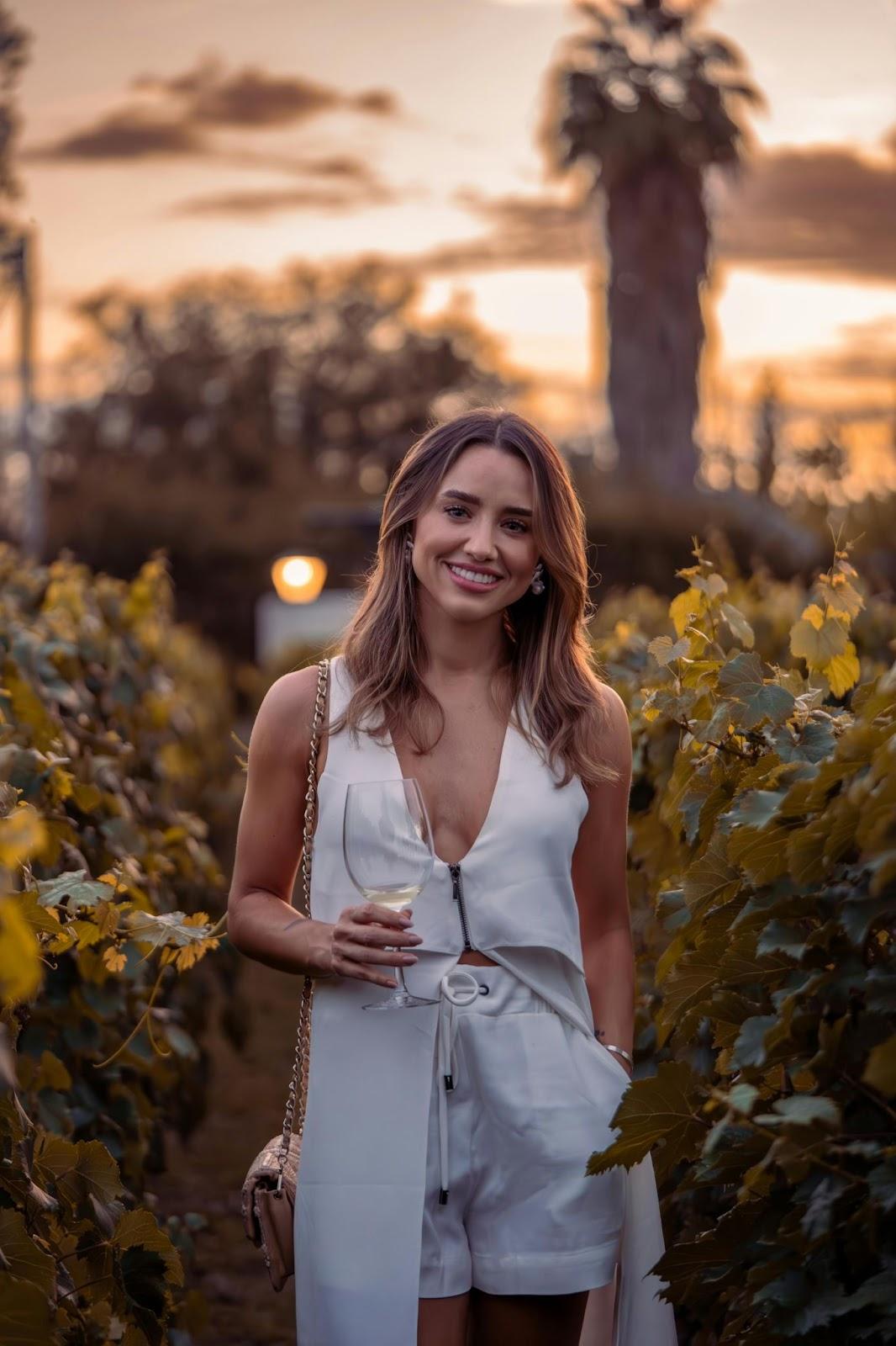 A women at a winery showing casual attire